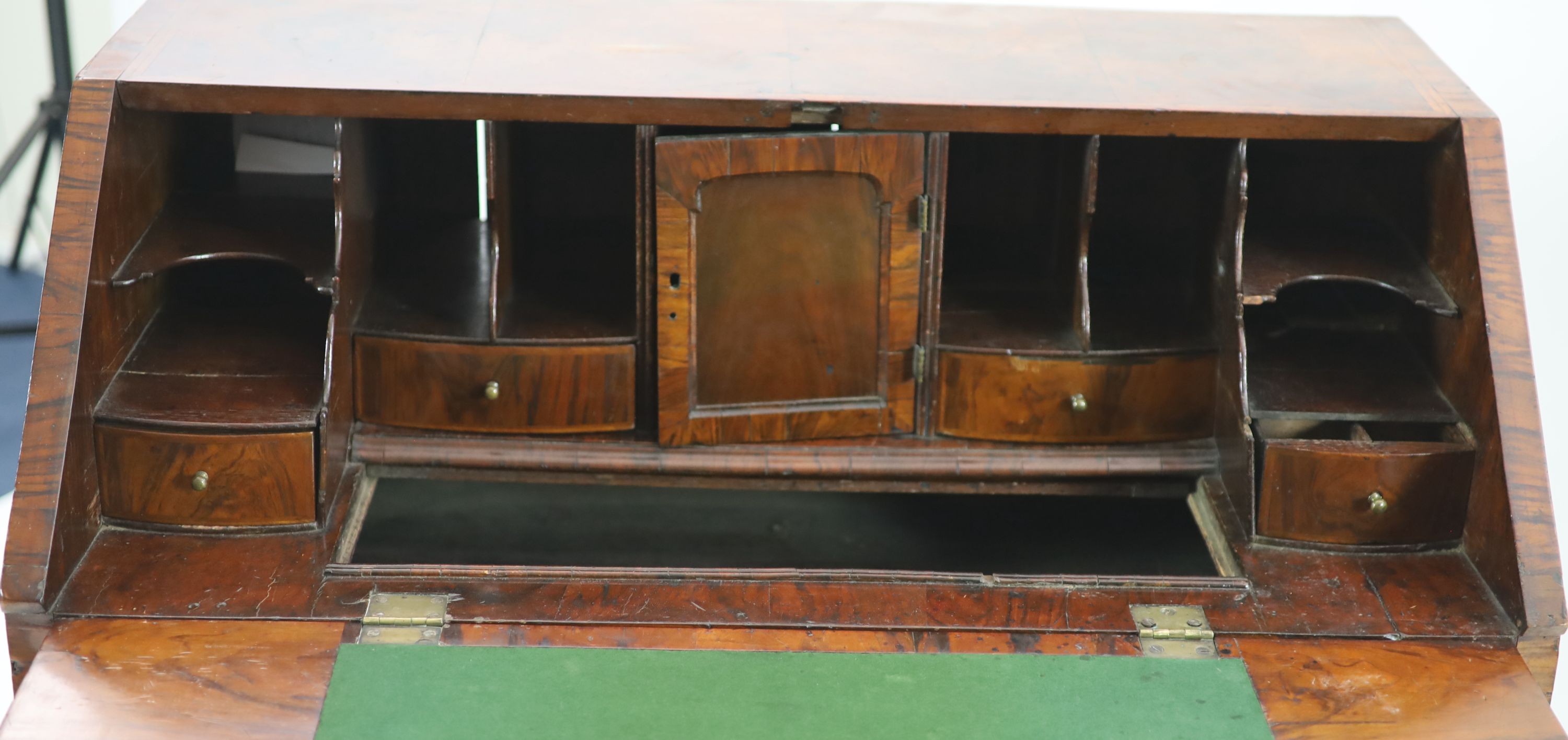 A George I walnut bureau, W.94cm D.52cm H.99cm